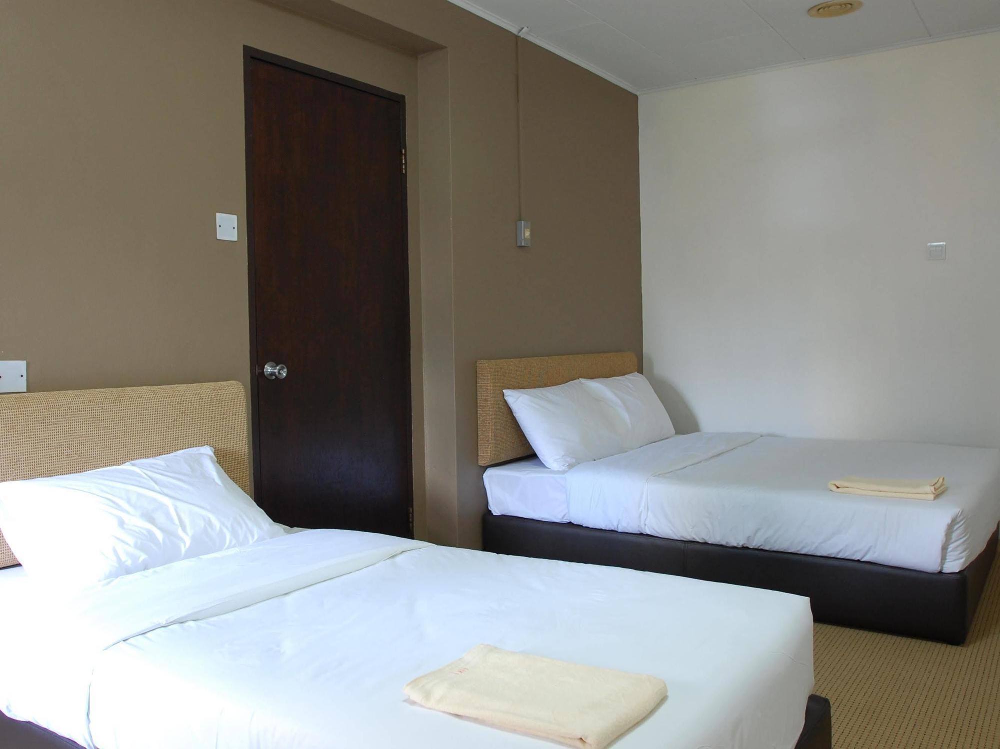 Super Oyo 979 Hua Kuok Hotel 2*